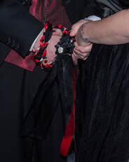 Deluxe Handfasting Cord binding Pagan couple during their ceremony. Bespoke Created by Vanessa at Aisle Do! Wedding Services, Ireland.